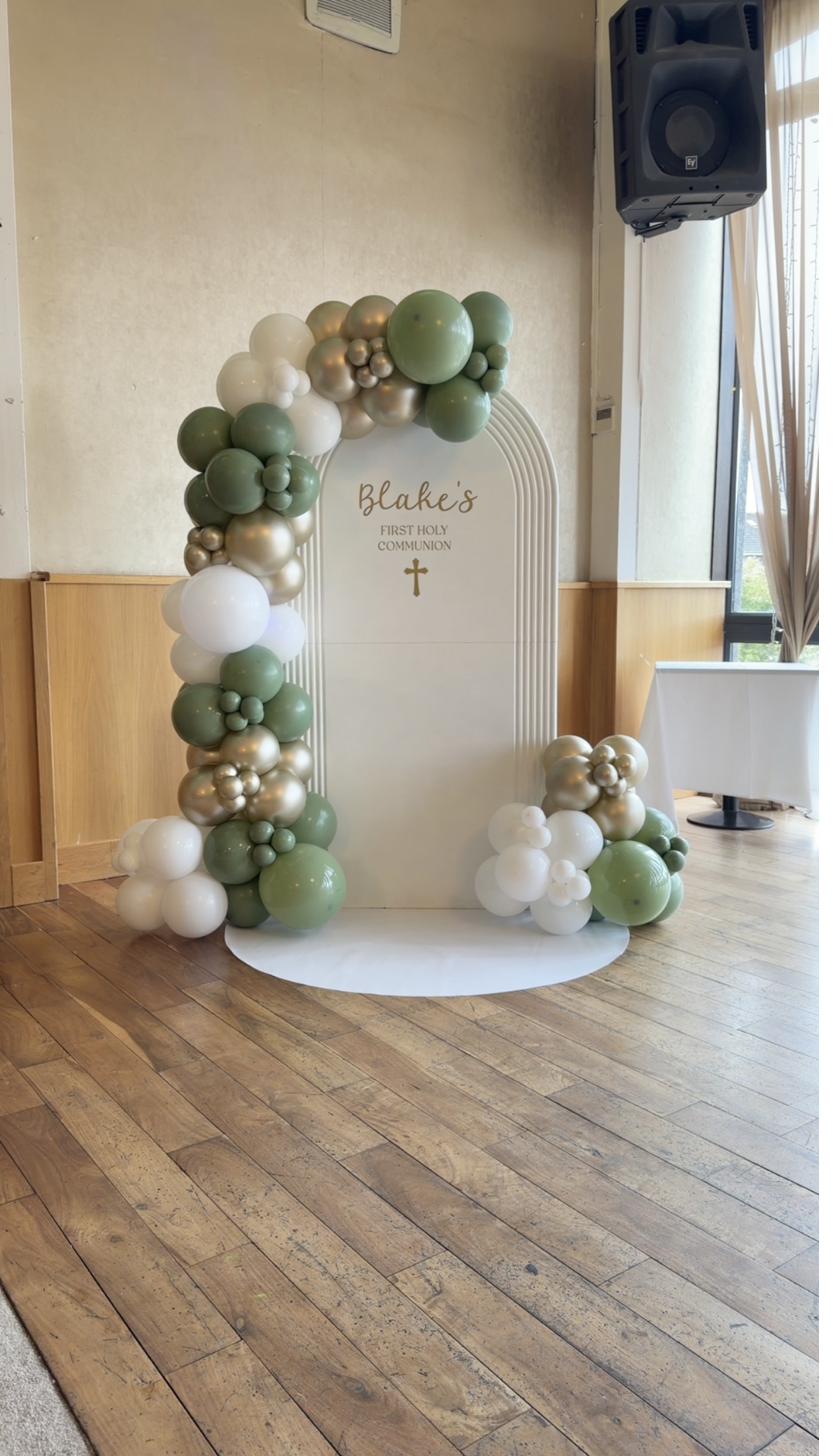Sage and gold first holy communion balloon arch