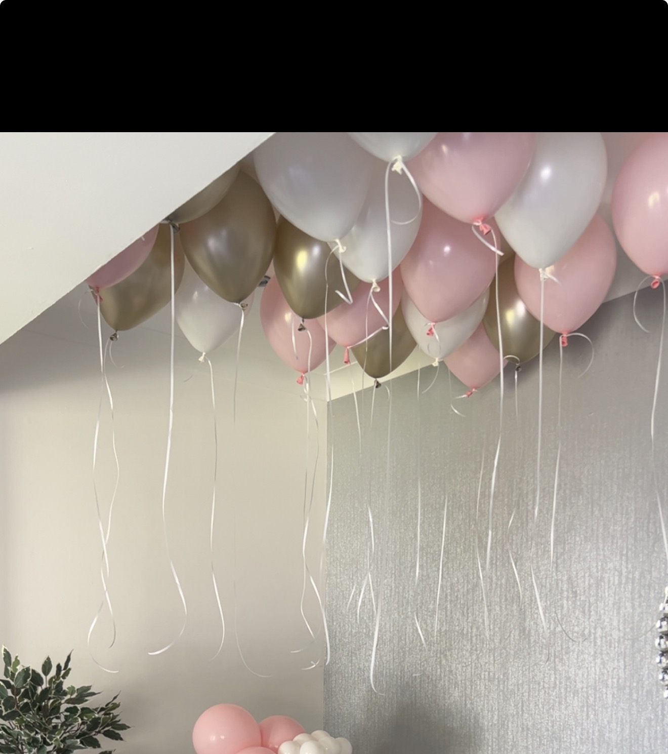 Helium ceiling balloons in pink, white and gold