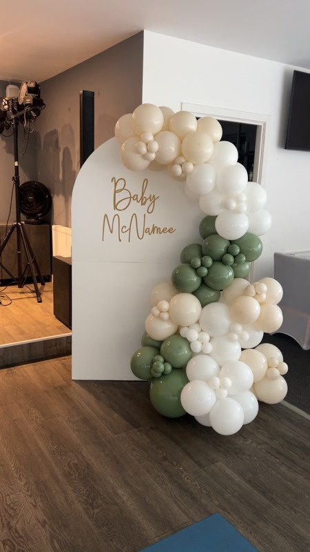 White sailboard backdrop with personalised lettering
